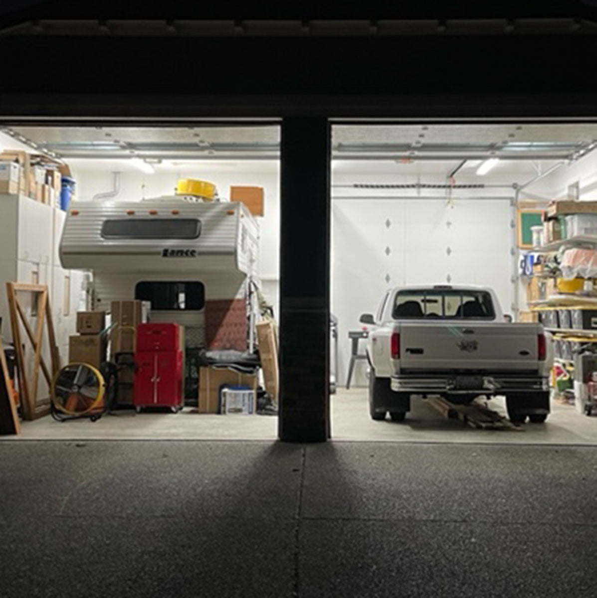 Brightly lit garage showing truck and camper illuminated by 8ft LED Tube 40W 7,200 lm ballast bypass lights