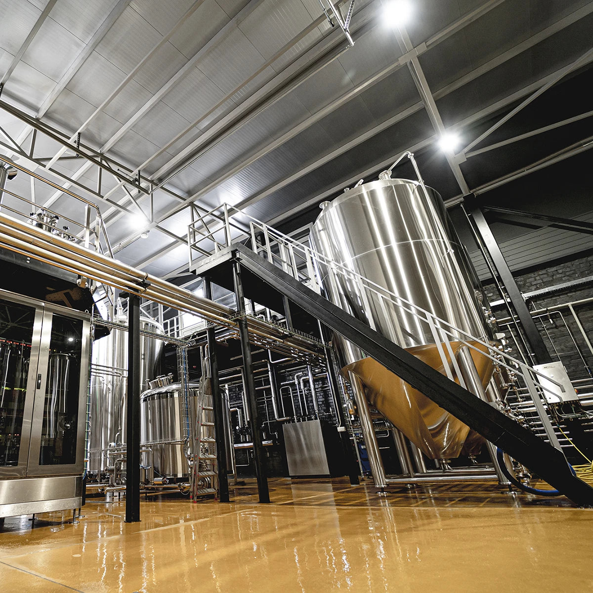 Industrial facility illuminated by LED Hazardous Location & Marine Grade Light 150W LED Living fixture