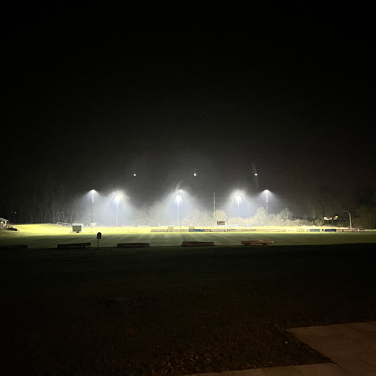 LED High Mast Light illuminating a large outdoor sports field with clear, bright, uniform light at night