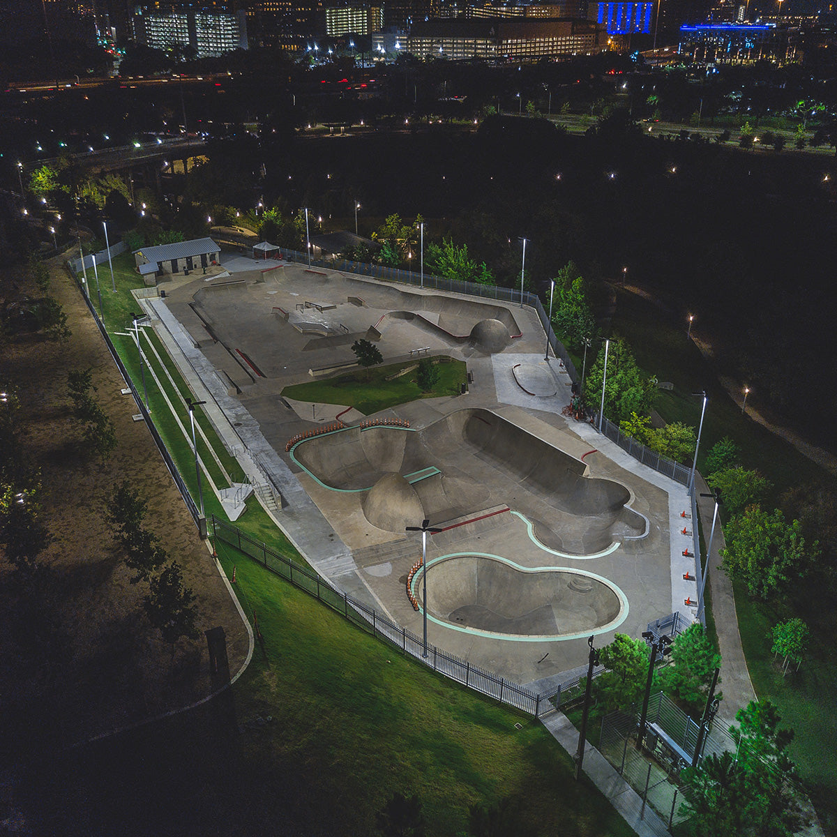 Skate park brightly illuminated at night by LED Flood Light - 350W providing wide, clear visibility and safety.