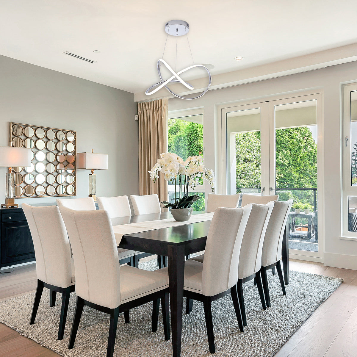 Modern dining room with LED Swirl Chandelier 3-CCT 30W pendant light and elegant white chairs around dark table