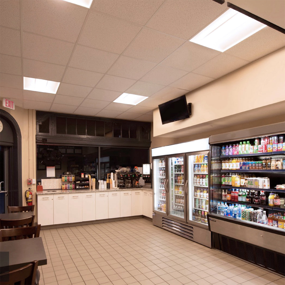 Interior of a brightly lit convenience store showcasing 2x4 LED Troffer 3 CCT 30/35/40W RAB SWISH34 lighting panels