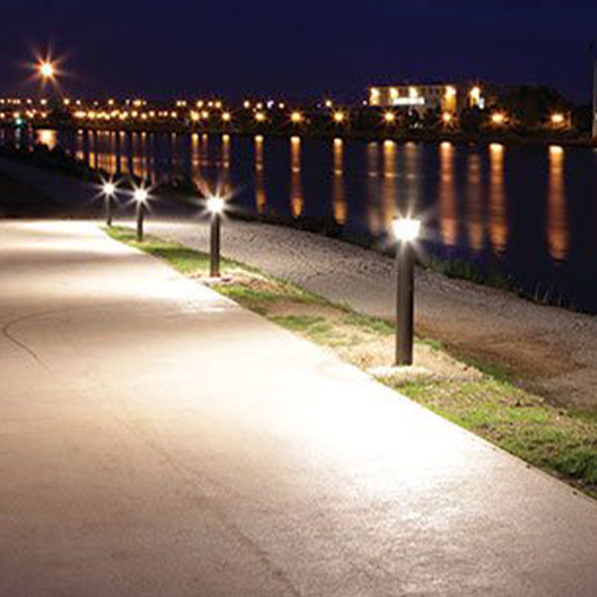 LED Bollard Retrofit 3 CCT 18W lighting a riverside path with bright, energy-efficient outdoor illumination at night