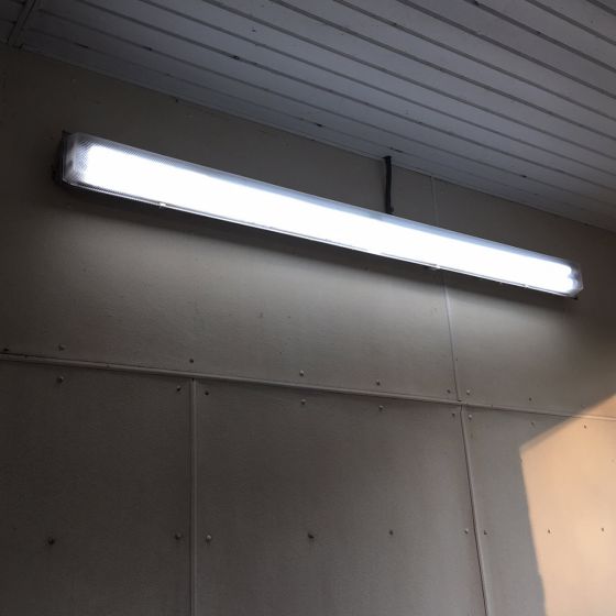 Brightly lit 8ft LED Tube 42W 6,930 lumens R17D HO installed on ceiling providing strong illumination