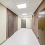 Brightly lit hallway ceiling panels featuring 2ft LED Tube 5 CCT Selectable 8W 10W 12W Type B lights