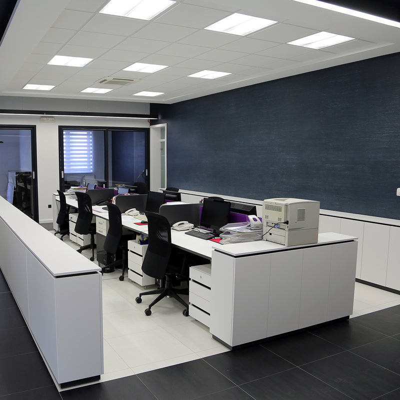 Modern office space with bright 2x2 LED Troffer Retrofit 3 CCT 18W 25W 30W RAB RTLED ceiling lights installed