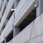 Semi Cutoff LED Wall Pack 125W mounted on parking garage exterior providing bright security lighting