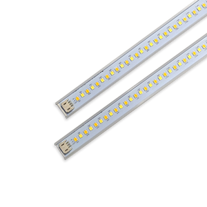 Close-up of two LED magnetic retrofit light strips for 2x4 or 1x4 troffers with quick-connect plug ends.