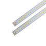 Close-up of two LED magnetic retrofit light strips for 2x4 or 1x4 troffers with quick-connect plug ends.