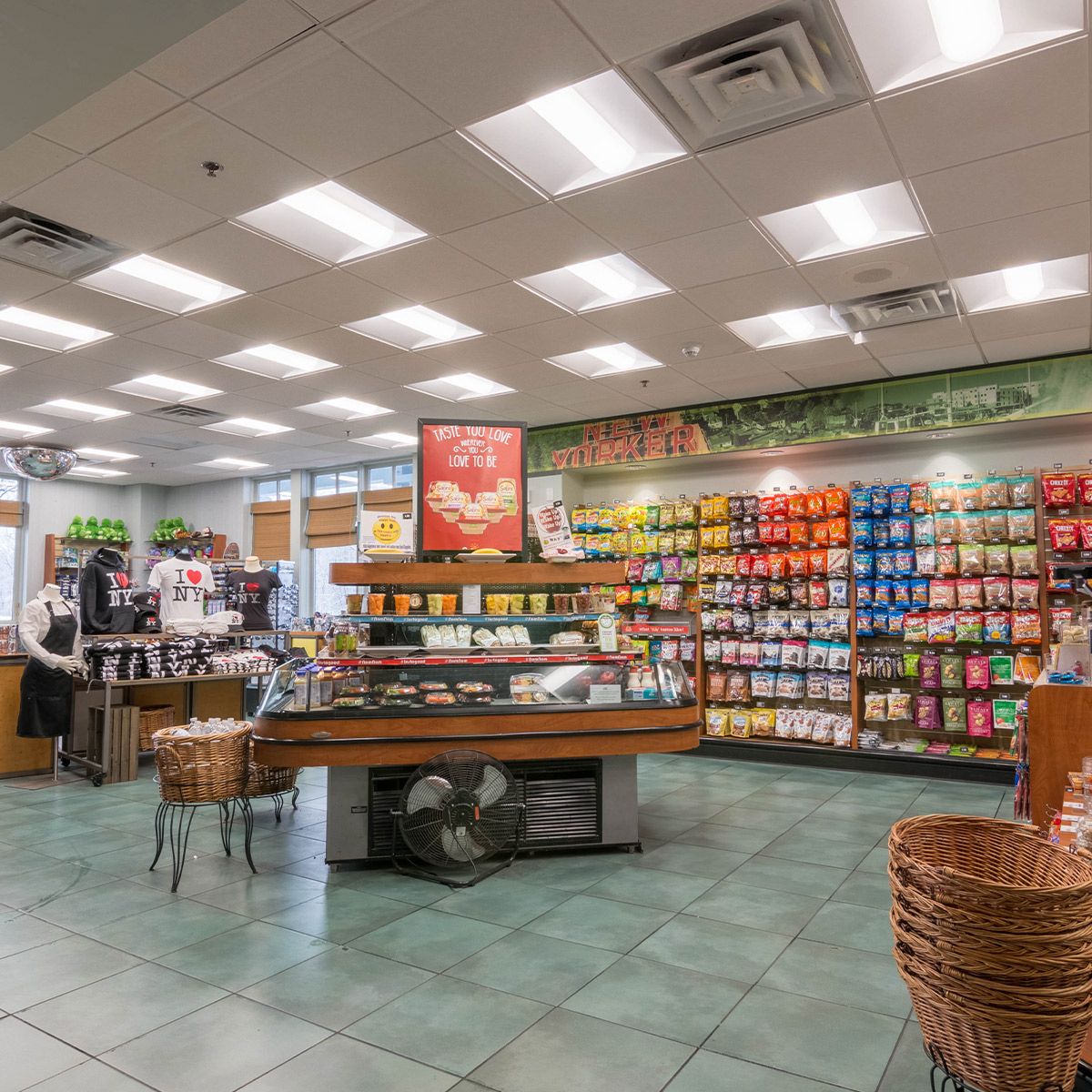 Retail store interior brightly lit by 2x2 LED Troffer 3 CCT 13W 20W 26W MaxLite ArcMax 2 Pack ceiling lights
