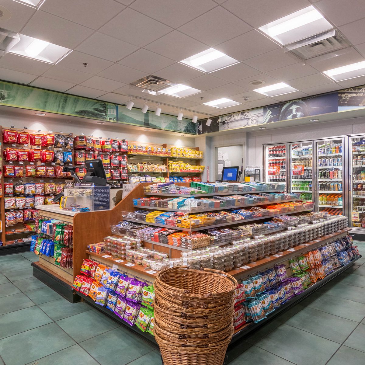 2x2 LED Troffer 3 CCT MaxLite ArcMax 13W 20W 26W lighting in a bright retail store ceiling panel setup
