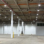 Spacious industrial warehouse illuminated by multiple UFO LED High Bay 3–CCT 60°/90°/120° 320/280/240W fixtures