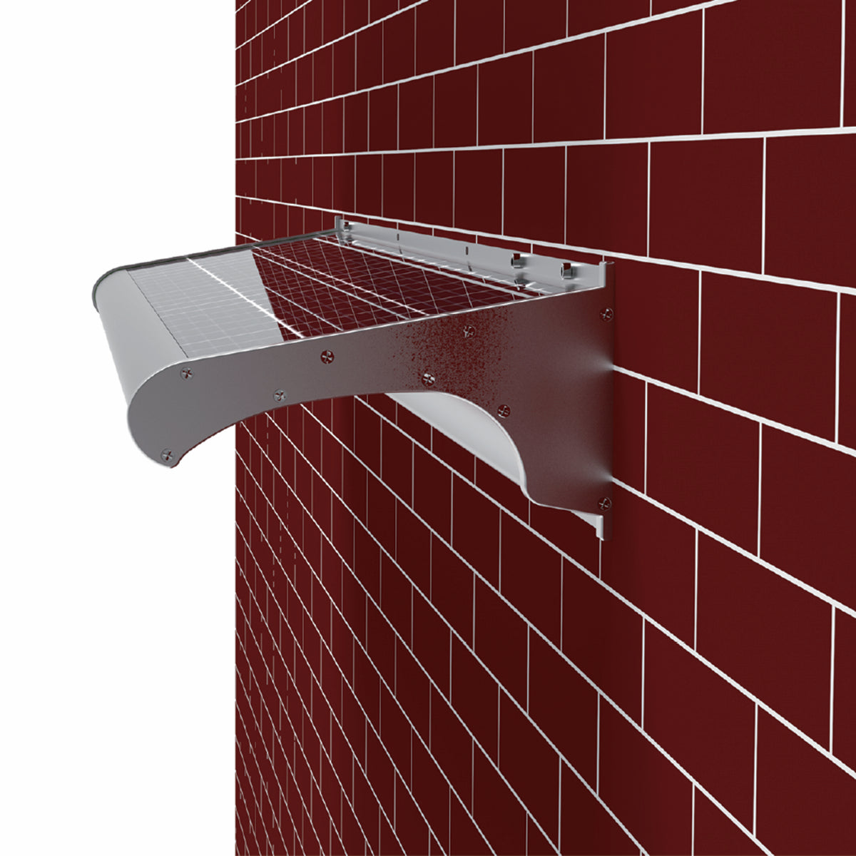 A silver solar sign light mounted against a red brick wall, shown at an angle with a white background visible on the left.