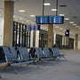 Modern airport waiting area illuminated by sleek 2ft U-Bend LED Tube 5 CCT Selectable 15W Type A+B Hybrid lighting