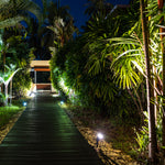 Outdoor pathway illuminated by LED Bullet Flood Light w/Photocell - 3 CCT - 9W/16W/25W - MaxLite BF at night