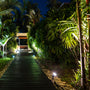 Outdoor pathway illuminated by LED Bullet Flood Light w/Photocell - 3 CCT - 9W/16W/25W - MaxLite BF at night