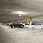 LED Canopy Light with Uplight - 3 CCT illuminating a spacious parking garage with clear, even lighting
