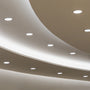 6 LED Downlight 5-CCT 13.5W Nora FLIN E installed in curved ceiling with soft white light illumination