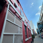 Full Cutoff LED Wall Pack 135W mounted on red brick building providing focused downward lighting at street level