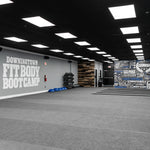 Interior view of a gym lit by 2x4 Archipelago Backlit LED Panel Lights 45W with selectable wattage and color temperature