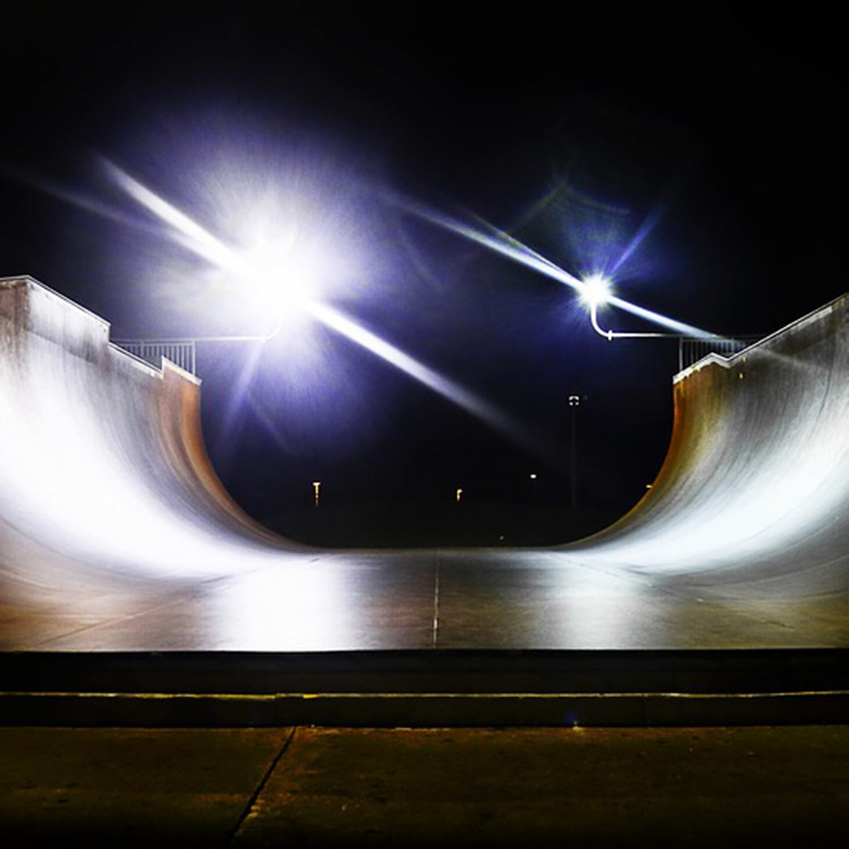 LED High Mast Light illuminating an empty skatepark ramp with bright, even light at night
