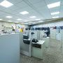Office space with bright uniform lighting from 2x2 LED Panel 40W RAB T34 installed in drop ceiling tiles