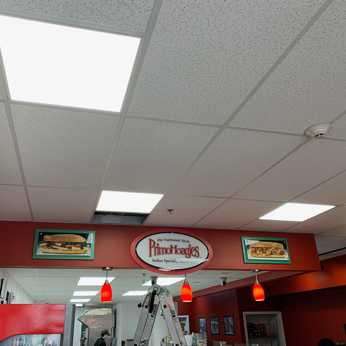 2x2 LED Panel 40W RAB T34 installed in drop ceiling providing bright, even lighting in commercial space