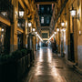 Nighttime view of an illuminated outdoor walkway showcasing LED Bollard Retrofit - 3 CCT - 12/18/24W lighting