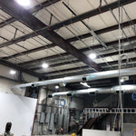 Industrial warehouse ceiling illuminated by multiple UFO LED High Bay 350W lights showing bright energy-efficient lighting