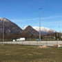Outdoor installation of Solar LED Area Light with Tiltable Lenses - 100W on tall poles in a mountainous area