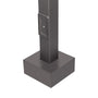 Close-up of the base and handhole of a Square Steel Light Pole - 4 inch with dark bronze finish and mounting plate