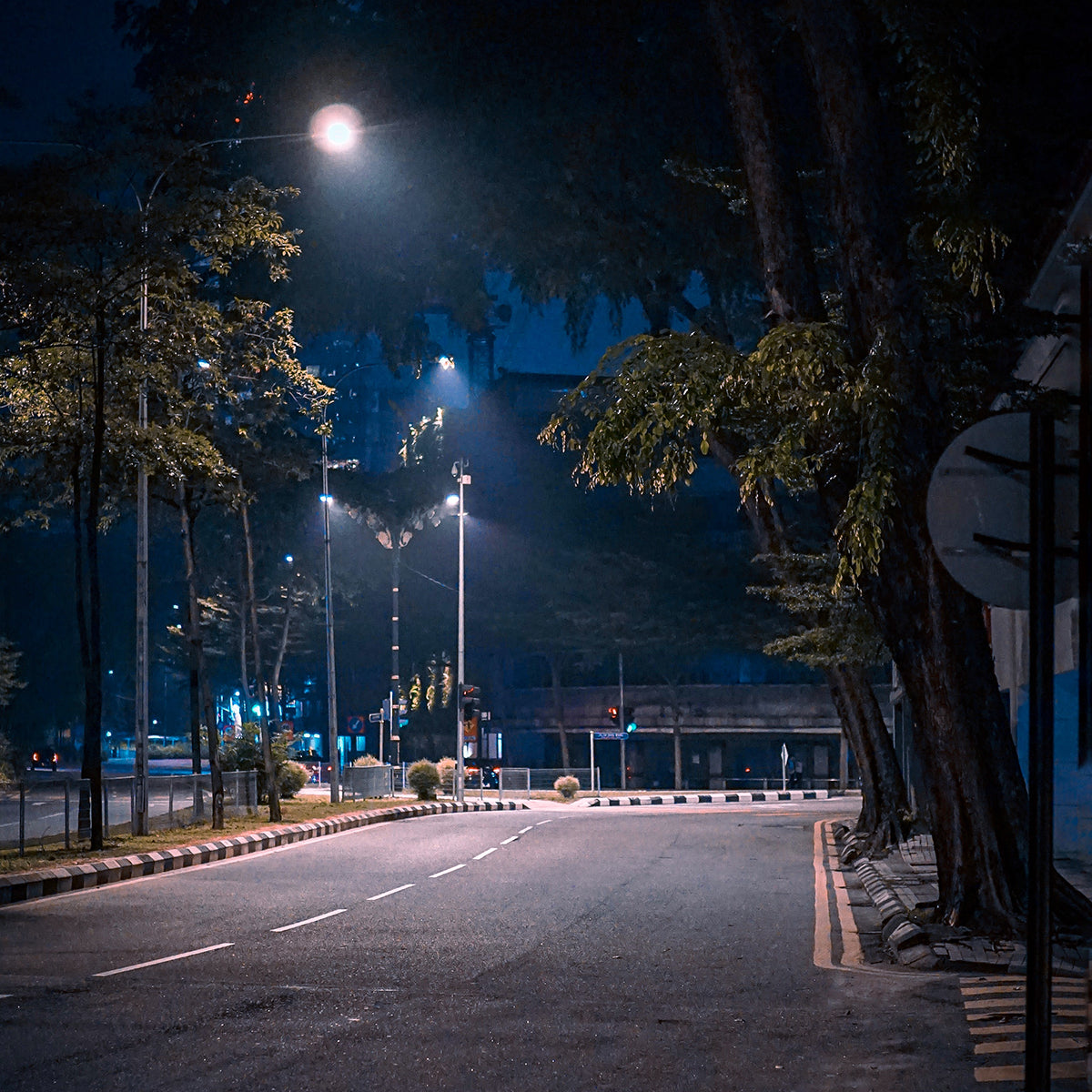 LED Street Light - 150W illuminating a quiet street at night with clear, bright, low-glare lighting and durable housing