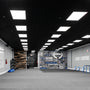 2x4 Backlit LED Panel – 3 CCT – 22W/30W/38W lights installed in a spacious indoor training facility ceiling.