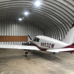 Refurbished High Power 450W Dimmable LED High Bay lights illuminating aircraft in a spacious hangar interior
