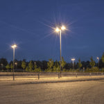 LED Architectural Shoebox Light 240W illuminating a parking lot with bright cold white light at night