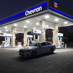LED Canopy Light 240W installed at gas station illuminating the fueling area with bright white light