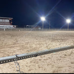 Outdoor sports arena illuminated at night by powerful LED Flood Light - 200W fixtures mounted on poles