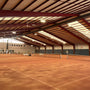 Indoor sports arena illuminated by Linear LED High Bay with swappable optics 400W lighting fixtures