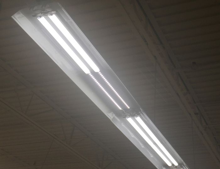 Isotropic Diffusion Lens for 2ft sections installed on ceiling with bright LED strip lights evenly diffusing illumination